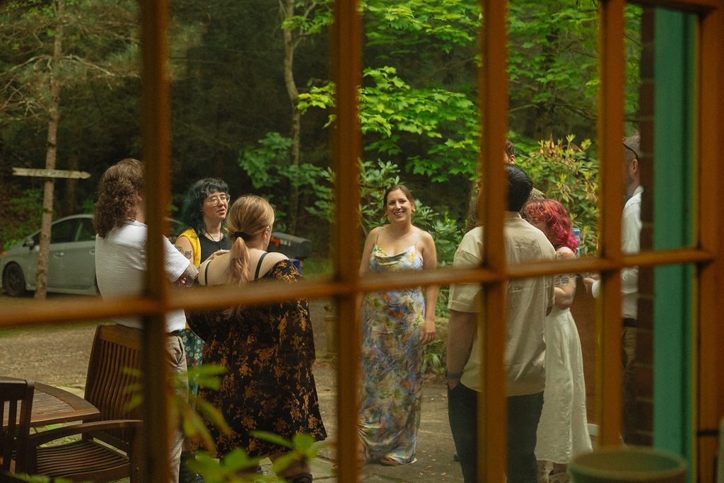 friends hanging out at rehearsal dinner